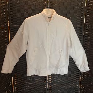 Vintage “Boast” windbreaker is off-white and in excellent condition, size medium